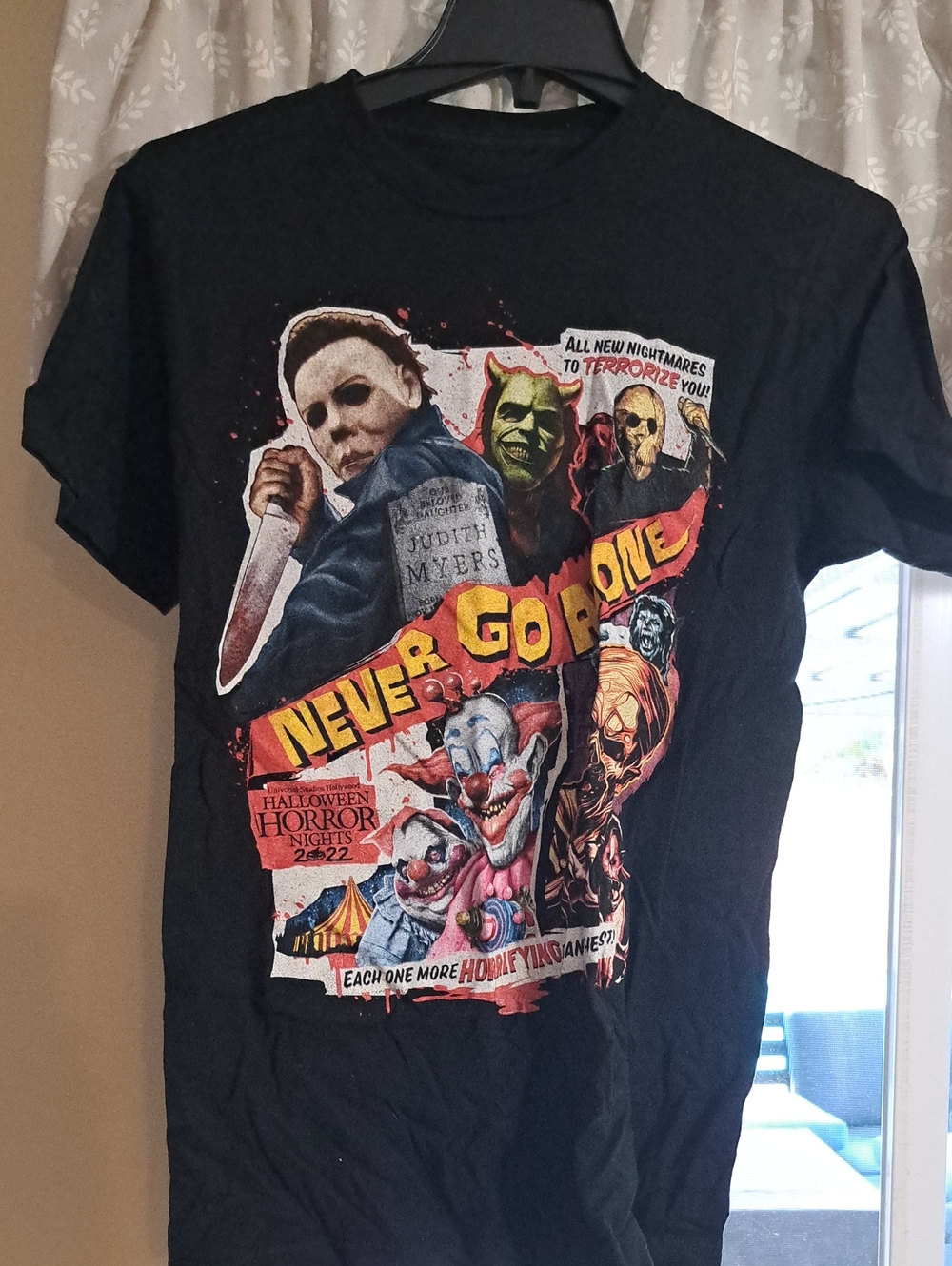 Never Go Alone Short Sleeve Graphic Tee - Black